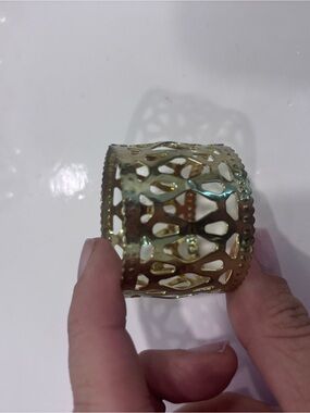 Set of 12 vintage gold toned pierced metal napkin rings-openwork brass look